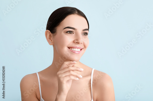 Beautiful young woman with ...