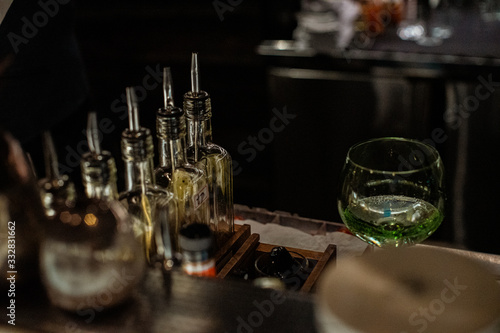 glass of water and bottle of wine on table