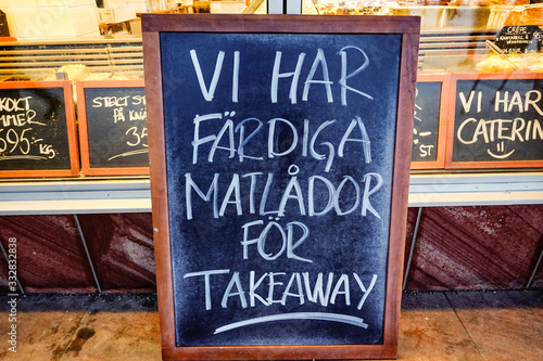 Stockholm, Sweden A fish store in Hogdalen advertises for takeaway on a blackboard. " We have ready made take away boxes"