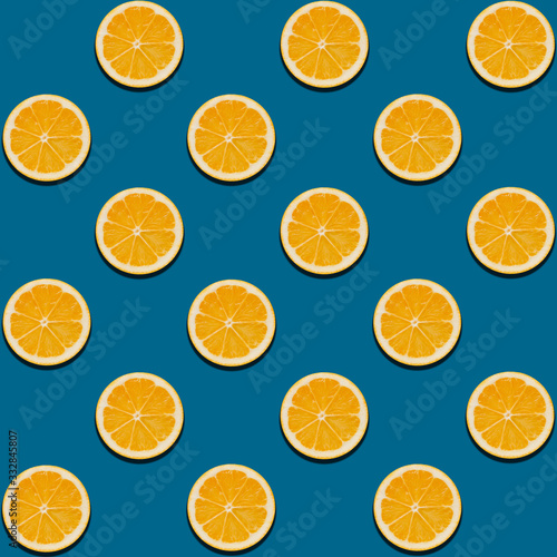 blue background with yellow lemon circles, top view, close-up, pattern