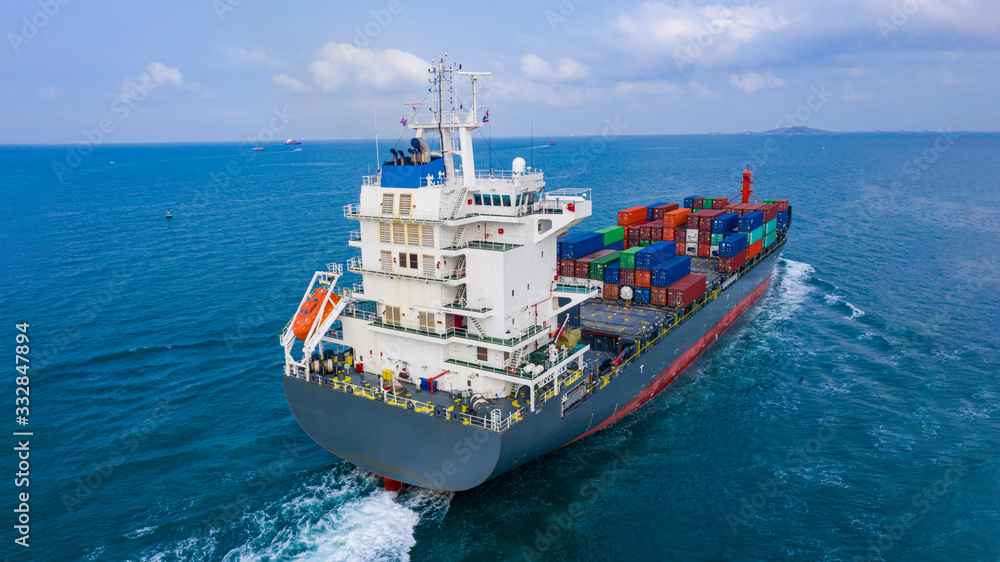 Aerial top view container ship. Business logistic transportation sea freight,Cargo ship, Cargo container in factory harbor at industrial estate for import export around in the world, Trade Port  