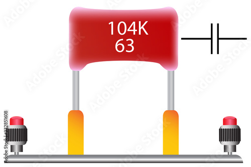 A film capacitor with a capacity of 100 nanofarads, which is used in radio engineering, is red. photo