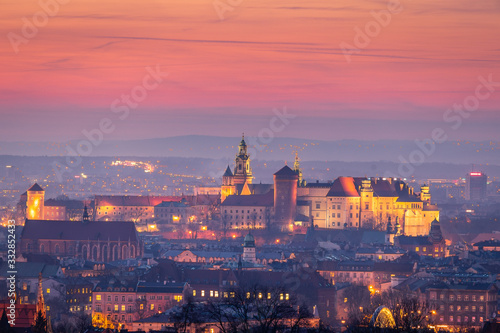 Fototapeta Naklejka Na Ścianę i Meble -  View to Cracow Old town in blue hour in autumn time. Cracow, Poland, october 14.2019