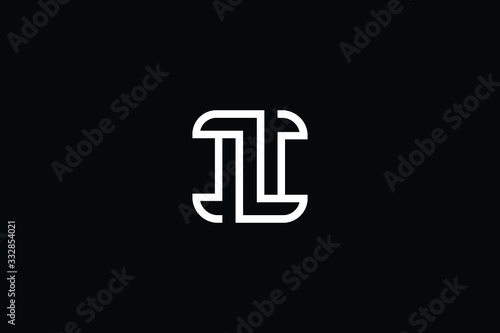 Minimal elegant monogram art logo. Outstanding professional trendy awesome artistic IZ ZI initial based Alphabet icon logo. Premium Business logo White color on black background