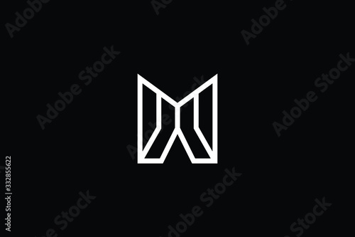 Minimal elegant monogram art logo. Outstanding professional trendy awesome artistic M MX XM initial based Alphabet icon logo. Premium Business logo White color on black background