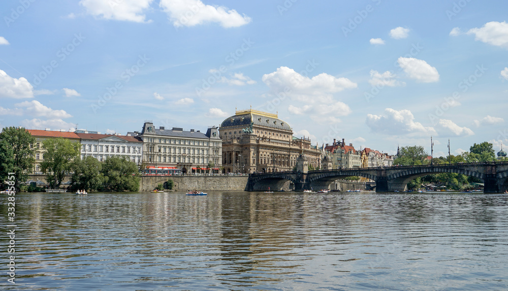 Fototapeta premium View of the National Theater in Prague on the shore of the Vltava