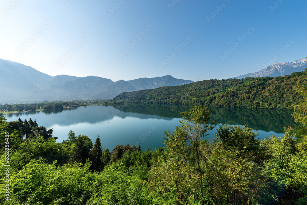 Lago di Levico, small beautiful lake in Italian Alps, Levico Terme town, Valsugana valley, Trento province, Trentino Alto Adige, Italy, Europe