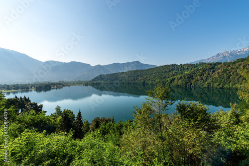 Lago di Levico, small beautiful lake in Italian Alps, Levico Terme town, Valsugana valley, Trento province, Trentino Alto Adige, Italy, Europe © Alberto Masnovo