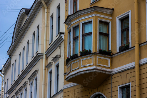 Beautiful old facade with an unusual balcony