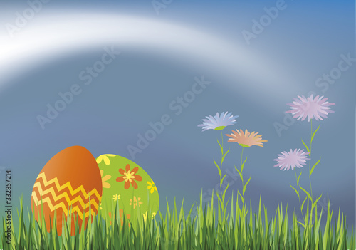 Easter decorative eggs on the grass with flowers
