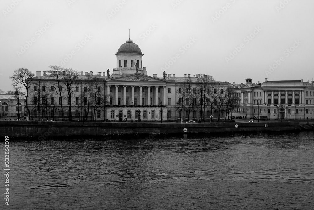 Historic building across the river against the sky