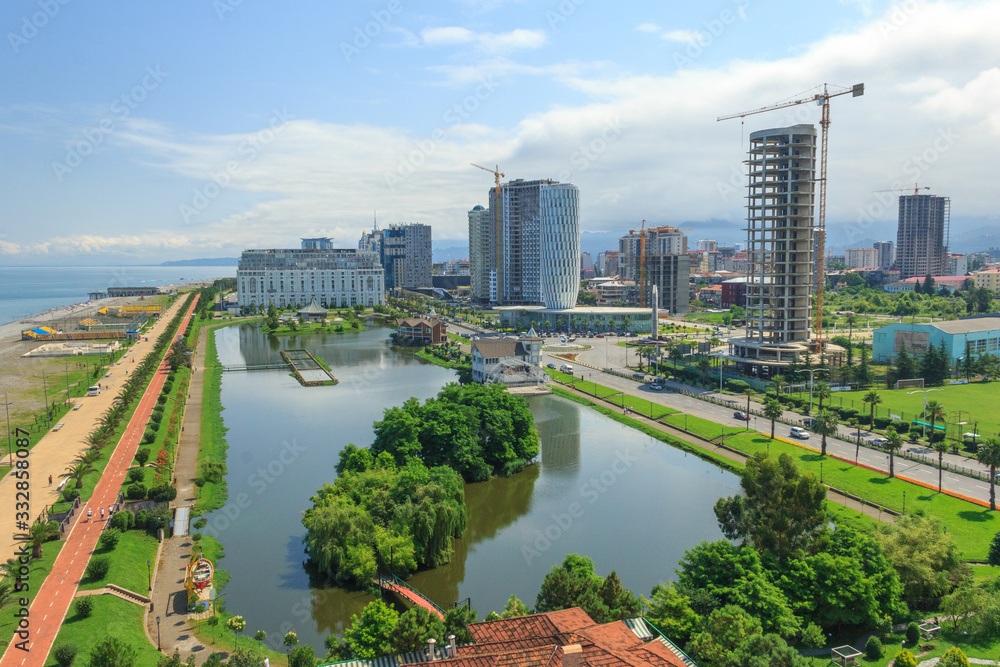 Fototapeta premium Top view of the embankment and modern buildings in Batumi. Georgia is a country at the junction of Europe and Asia and attracts many tourists from all over the world. The concept of a tourist site.