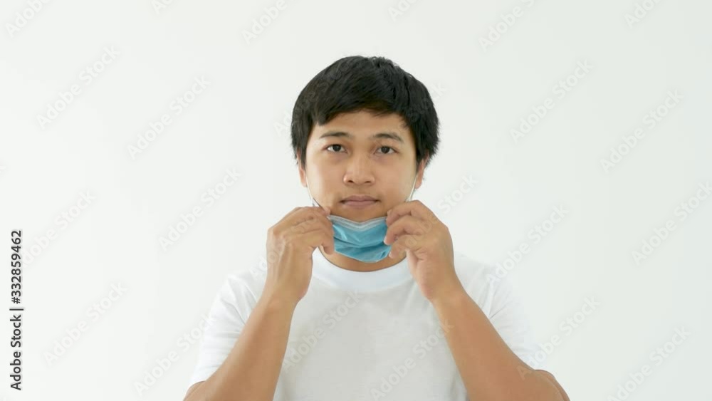Correct way of using the mask for protection disease or pullutions such as coronavirus, dust, chemical. Person model is on white background. Health care footage video in HD resolution. Correct way of using the mask for protection disease or pullutions such as coronavirus, dust, chemical. Person model is on white background. Health care footage video in HD resolution.
