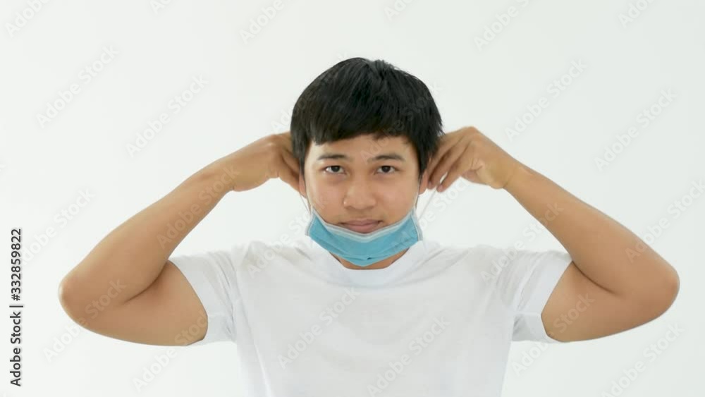 Correct way of using the mask for protection disease or pullutions such as influenza, coronavirus, dust, chemical. Person model is on white background. Health care footage video in full HD resolution. Correct way of using the mask for protection disease or pullutions such as influenza, coronavirus, dust, chemical. Person model is on white background. Health care footage video in full HD resolution.