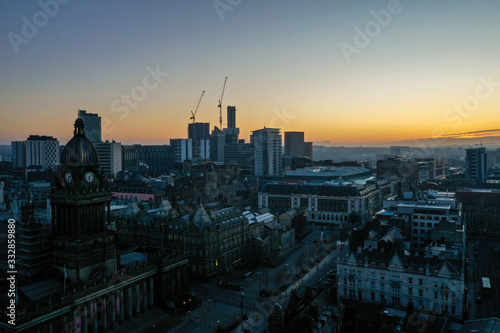 Aerial photo of a beautiful sunrise rising over the town of Leeds in West Yorkshire UK.