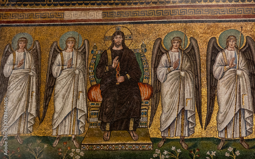 Mosaic of the enthroned Christus with four vanguard angels in Basilica of St Apollinare Nuovo in Ravenna, Italy