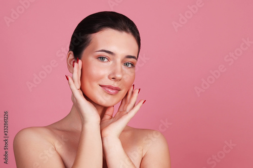 Beautiful girl with healthy clean skin, advertising cosmetics for the face, beauty photo