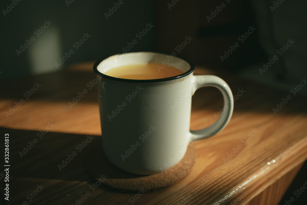 Fresh orange drink on wooden tea table in the morning. Fresh orange drink on wooden tea table in the morning.