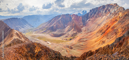 Mountain landscape. Canyon and colored rocks. Mountain pass, trekking.