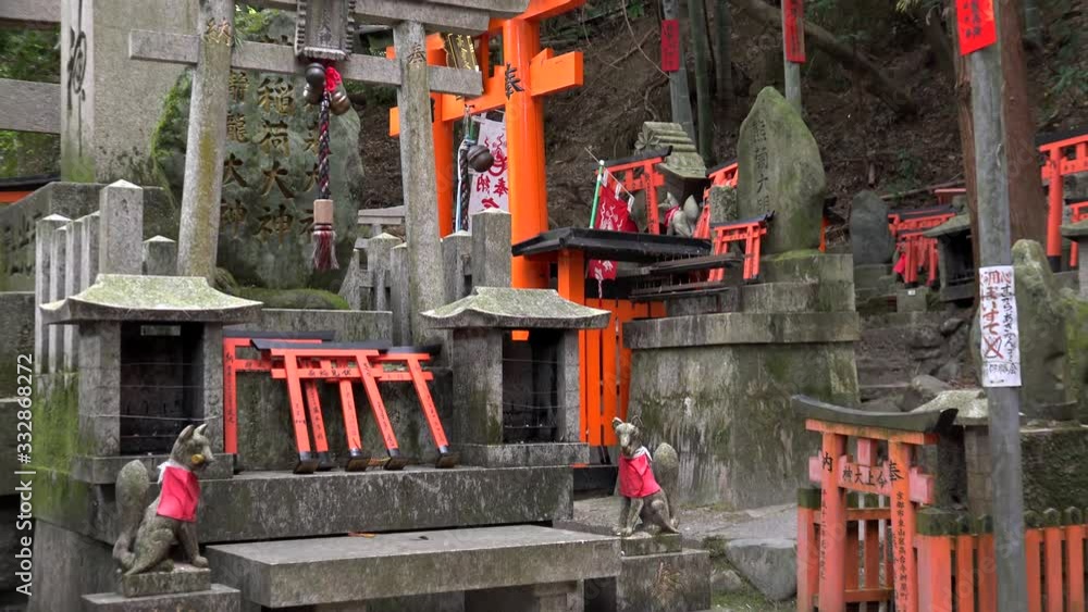 Shinto shrines of Fushimi Inari Taisha on Senbon Torii path (Inariyama mount). Shinto shrines of Fushimi Inari Taisha on Senbon Torii path (Inariyama mount).