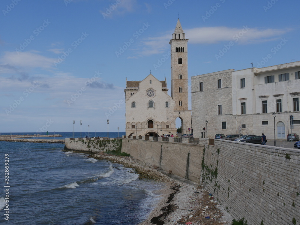 Trani – Cathedral of Saint Nicholas the Pilgrim with romanesque facade and the bell tower built using the white local stone