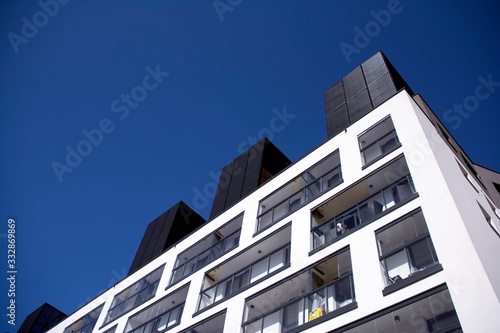 Modern european apartment building with balconies on a clear sunny day