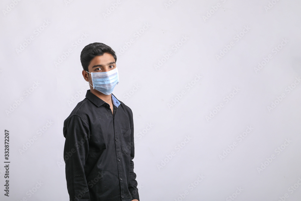 Young man wearing protective mask again Covid-19. corona virus. Young man wearing protective mask again Covid-19. corona virus.