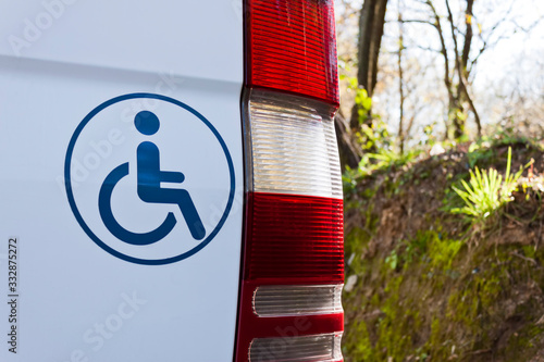 Accessible vehicle sign on white van