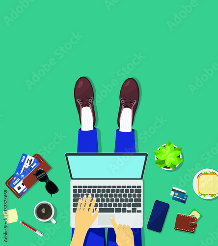 Home office. Man seating on the floor with laptop working