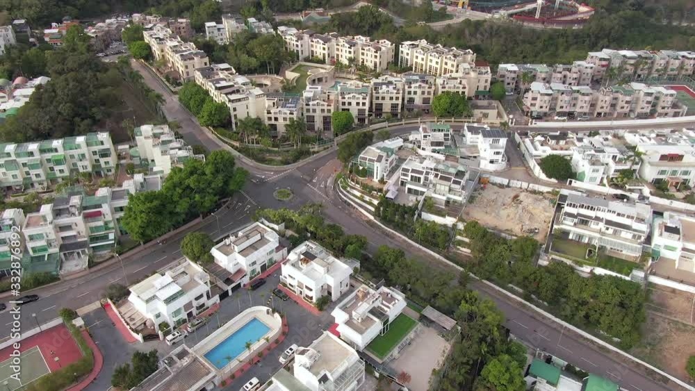 Aerial view of Hong Kong Suburban houses on Lion Rock mountains slope. Aerial view of Hong Kong Suburban houses on Lion Rock mountains slope.