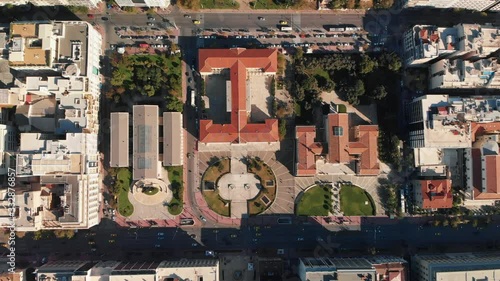 Athens city road at morning, University of Athens Central Building zoom out aerial drone shot photo