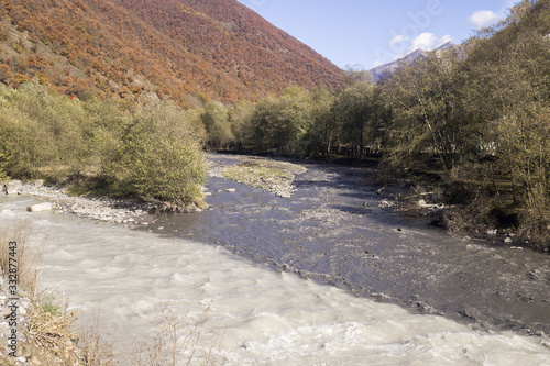 Black and white river - connection of two rivers in Georgia. photo