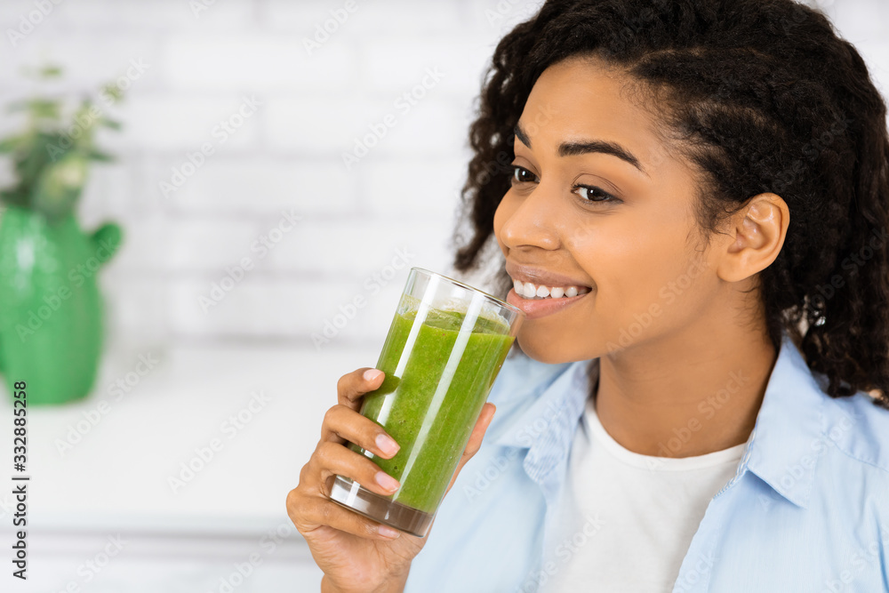 Fit Black Girl Drinking Delicious Green Detox Smoothie Fit Black Girl Drinking Delicious Green Detox Smoothie