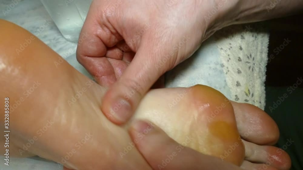 therapeutic massage with his feet with his hands therapeutic massage with his feet with his hands