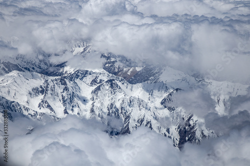 Blue Sky With Clouds from Airplane over Leh,himalaya mountain, India. The Upper Layers Of The Atmosphere. © chayakorn