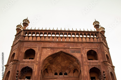 Jama Masjid from outside wall in Old Delhi, India during sunset. photo