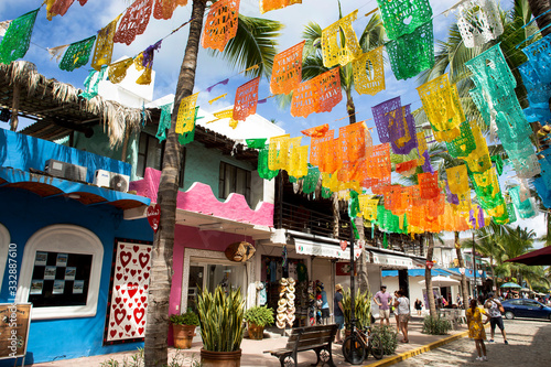 Colourful Mexican flags decorating the town of Sayulita, Mexico photo