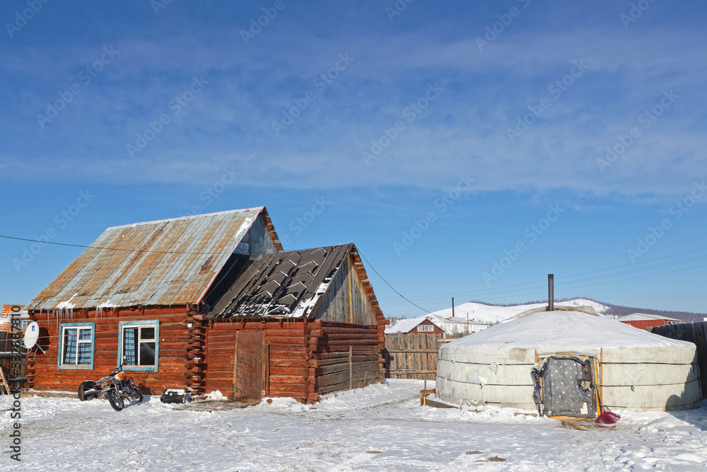 KHATGAL, MONGOLIA, February 25, 2020 : Houses of Khatgal. The small town is known as one of the coldest cities in Mongolia but it owes its recent development to tourism. KHATGAL, MONGOLIA, February 25, 2020 : Houses of Khatgal. The small town is known as one of the coldest cities in Mongolia but it owes its recent development to tourism.