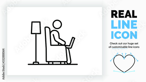 editable real line icon of a stick figure person working at home with his laptop on his lap sitting in a comfortable chair in the living room with a lamp behind him in modern black vector lines