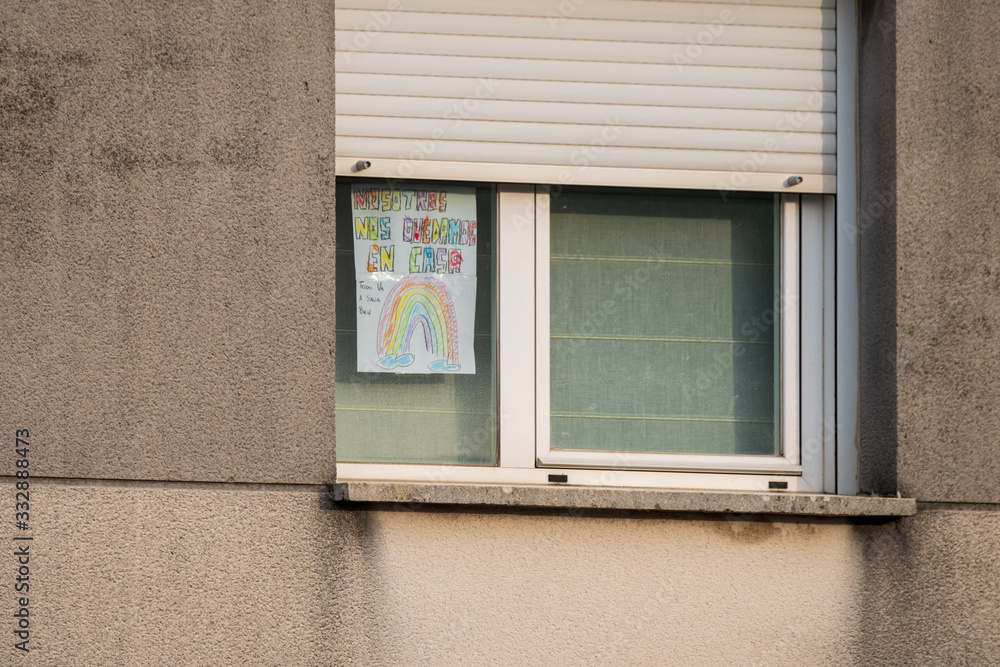 Barakaldo, Vizcaya (España) 22th of March 2020 A window with the drawings of kids asking for staying at home during the COVID-19 quarantine in Spain in 2020