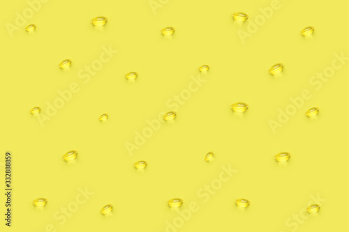 Vitamin d pattern on yellow background. Top view. Clip art.
