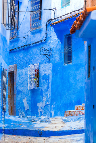 View of the street of the blue town Chefchaouen, Morocco. Vertical. © ggfoto