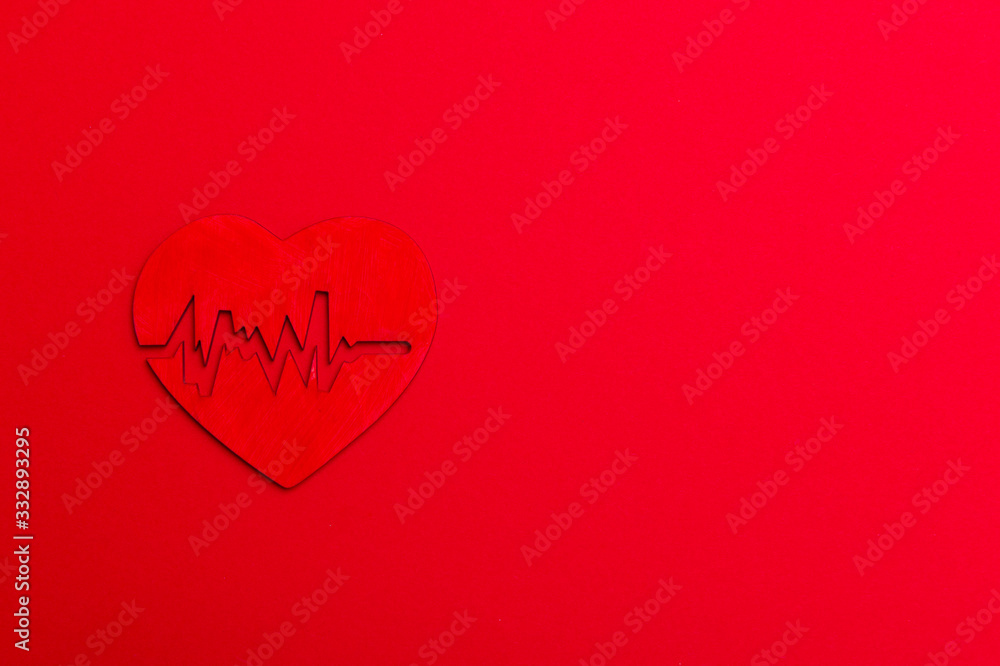 Electrocardiogram and heart sign on background