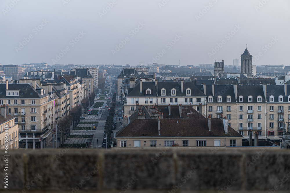 Gorgeous cityscape from the castle of Caen with a thick haze over the city