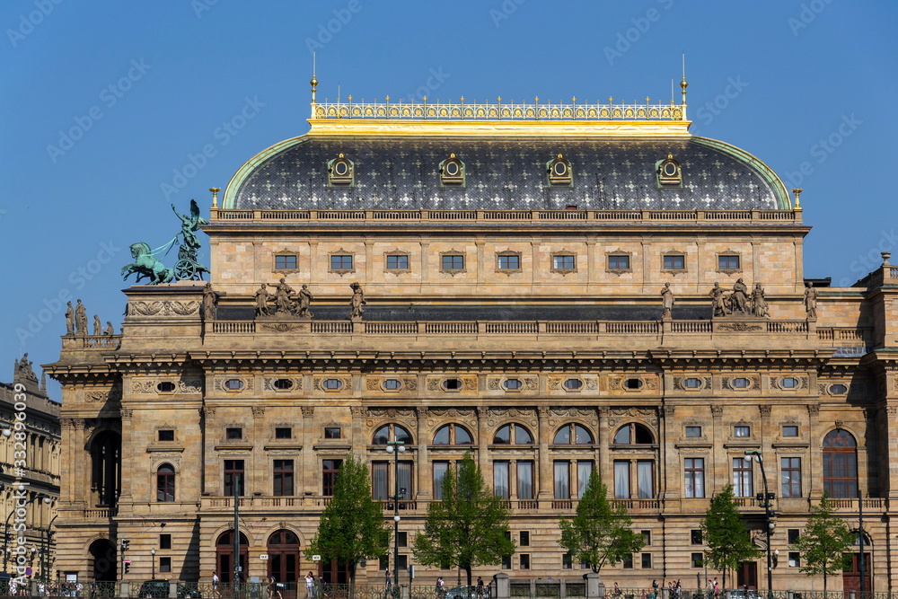 Obraz premium Prague panorama with National Theatre on the bank of Vltava River, Prague, Czech Republic, sunny summer day
