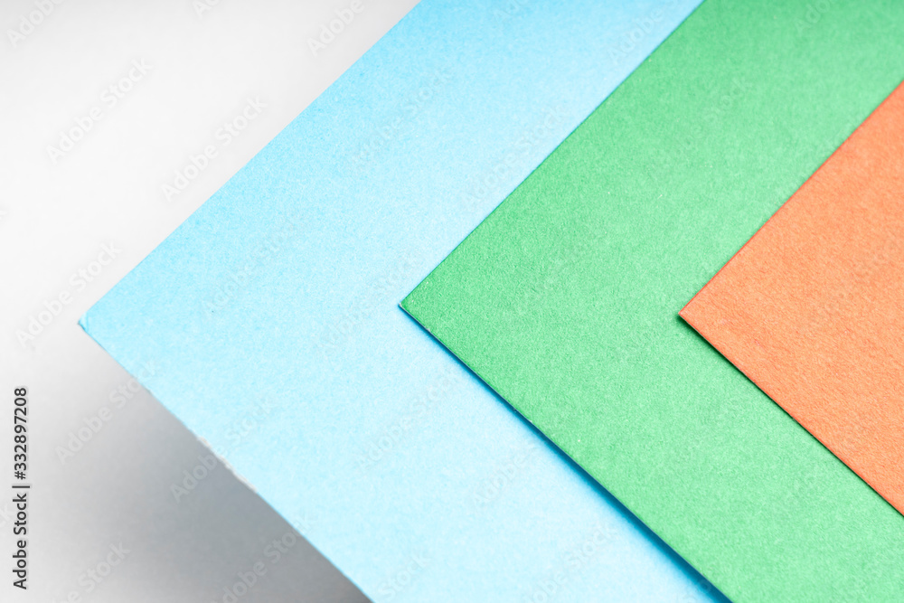 multi-colored sheets of paper , abstract background, tinted image, selective focus multi-colored sheets of paper , abstract background, tinted image, selective focus