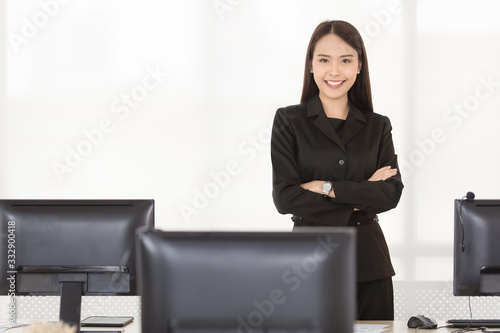 Businesswoman standing and smiling