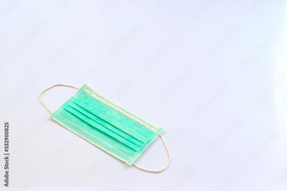 Antiviral medical mask for protection against COVID - 19. Surgical protective mask. Corona virus protection isolated on a white background Antiviral medical mask for protection against COVID - 19. Surgical protective mask. Corona virus protection isolated on a white background
