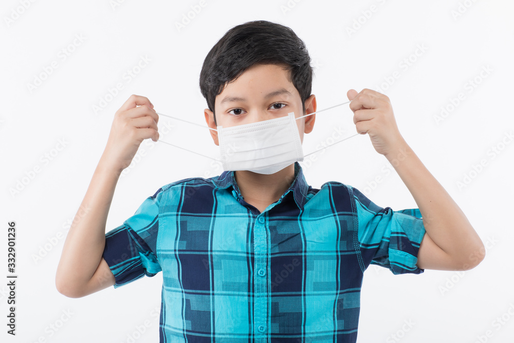 Boy preparing for wearing mask Boy preparing for wearing mask