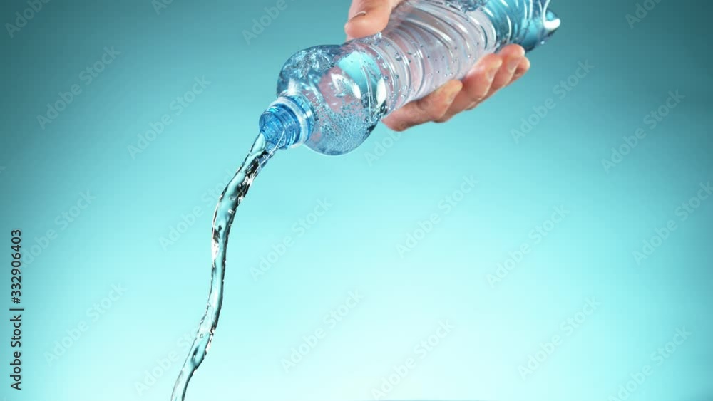 Super slow motion of splashing water from bottle. Filmed on very high speed camera, 1000 fps. Super slow motion of splashing water from bottle. Filmed on very high speed camera, 1000 fps.